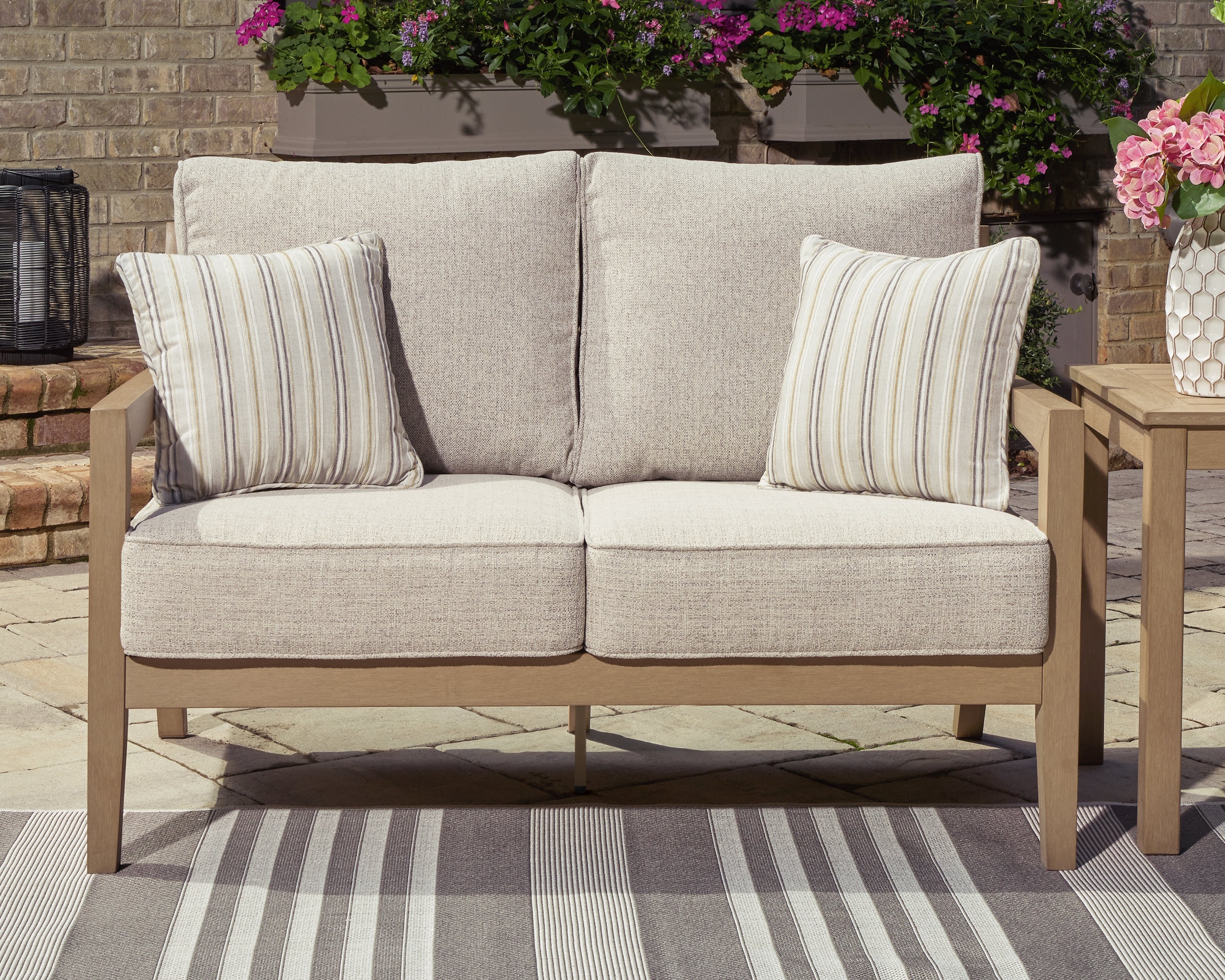 Homestyle Furniture - Ashley Furniture - Hallow Creek Outdoor Loveseat with Cushion - Loveseat w/Cushion - P560-835