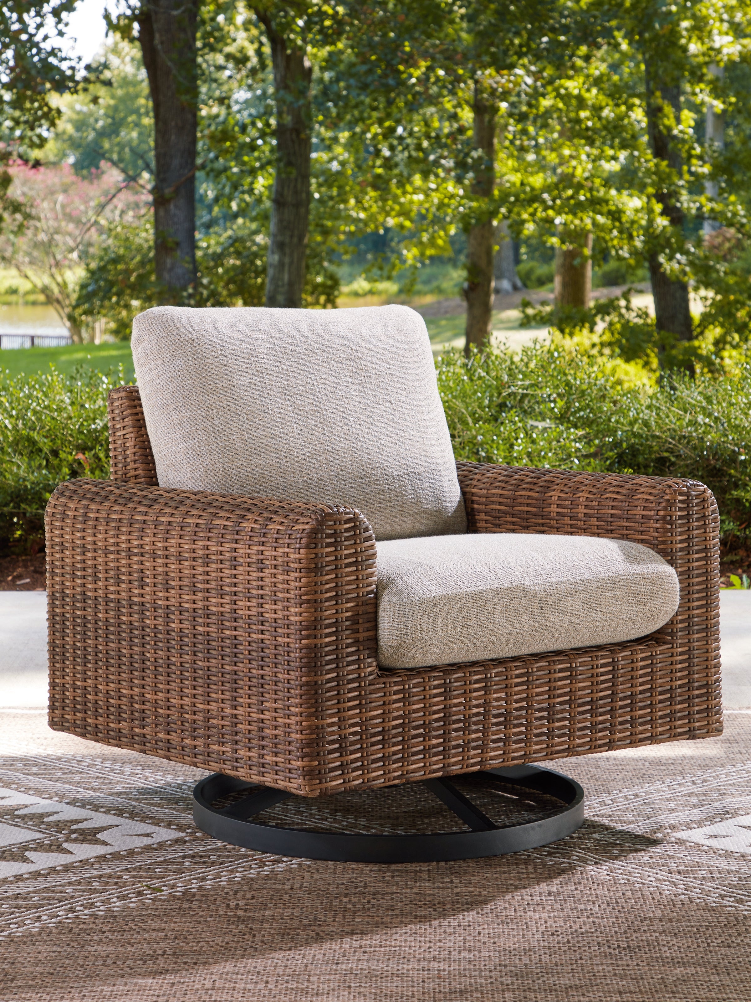 Homestyle Furniture - Ashley Furniture - Dolan Creek Outdoor Swivel Lounge Chair with Cushion - Swivel Lounge w/ Cushion - PCP610-821