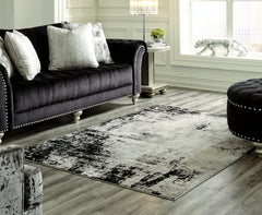 Homestyle Furniture - Ashley Furniture - Zekeman 7'10" x 10' Rug - 7'10" x 10' Rug - R404921