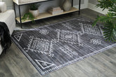 Homestyle Furniture - Ashley Furniture - Arloman 5' x 7' Washable Rug - 5' x 7' Washable Rug - R405932