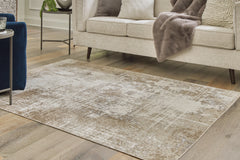 Homestyle Furniture - Ashley Furniture - Grifflain 5'1" x 7' Washable Rug - 5'1" x 7' Washable Rug - R406232