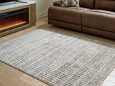 Homestyle Furniture - Ashley Furniture - Fuadwick 5'3" x 7' Area Rug - 5'3" x 7' Area Rug - R407692
