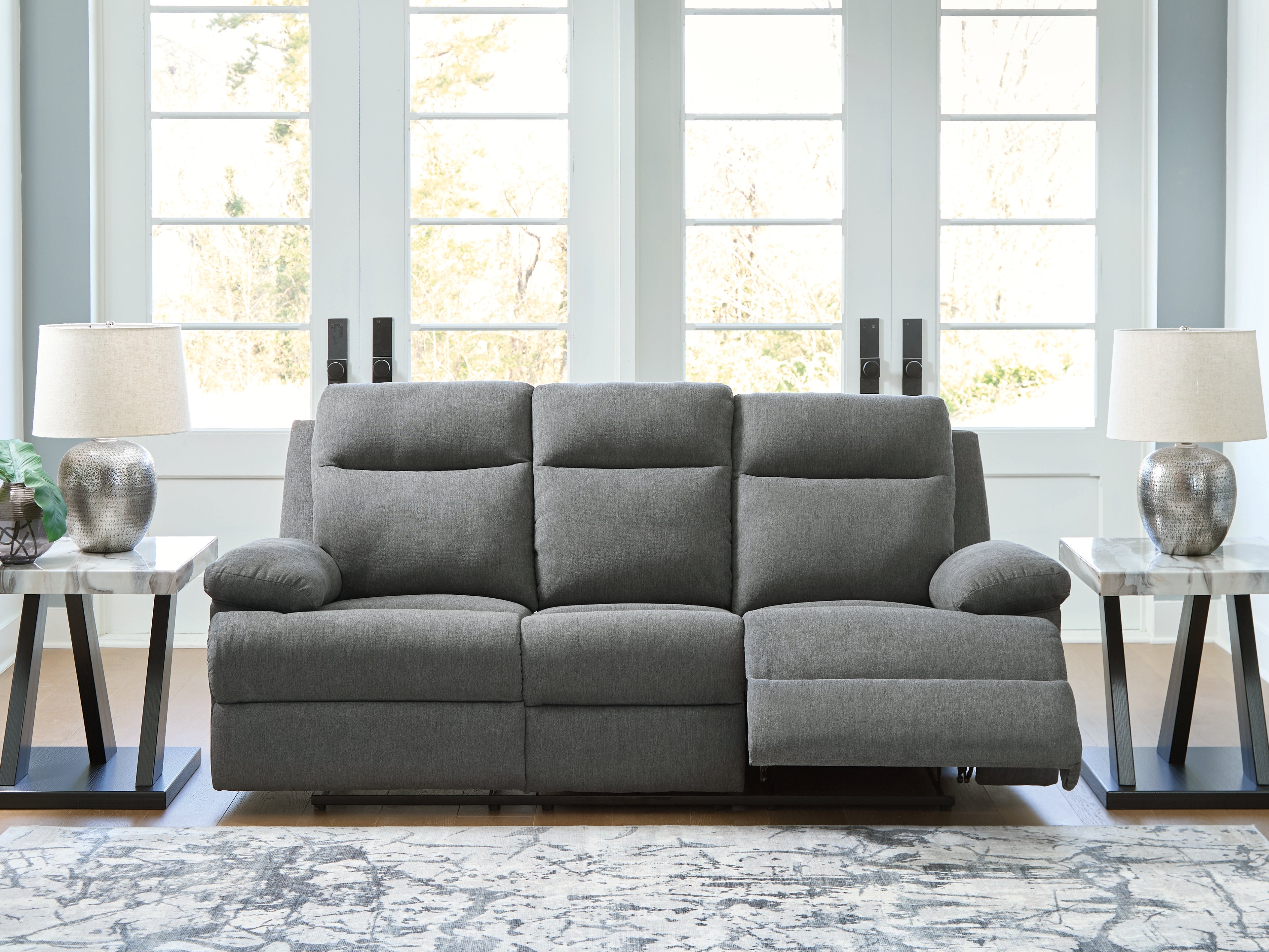 Homestyle Furniture - Ashley Furniture - Side-Swipe Reclining Sofa with Drop Down Table - REC Sofa w/Drop Down Table / Charcoal - PC9140689