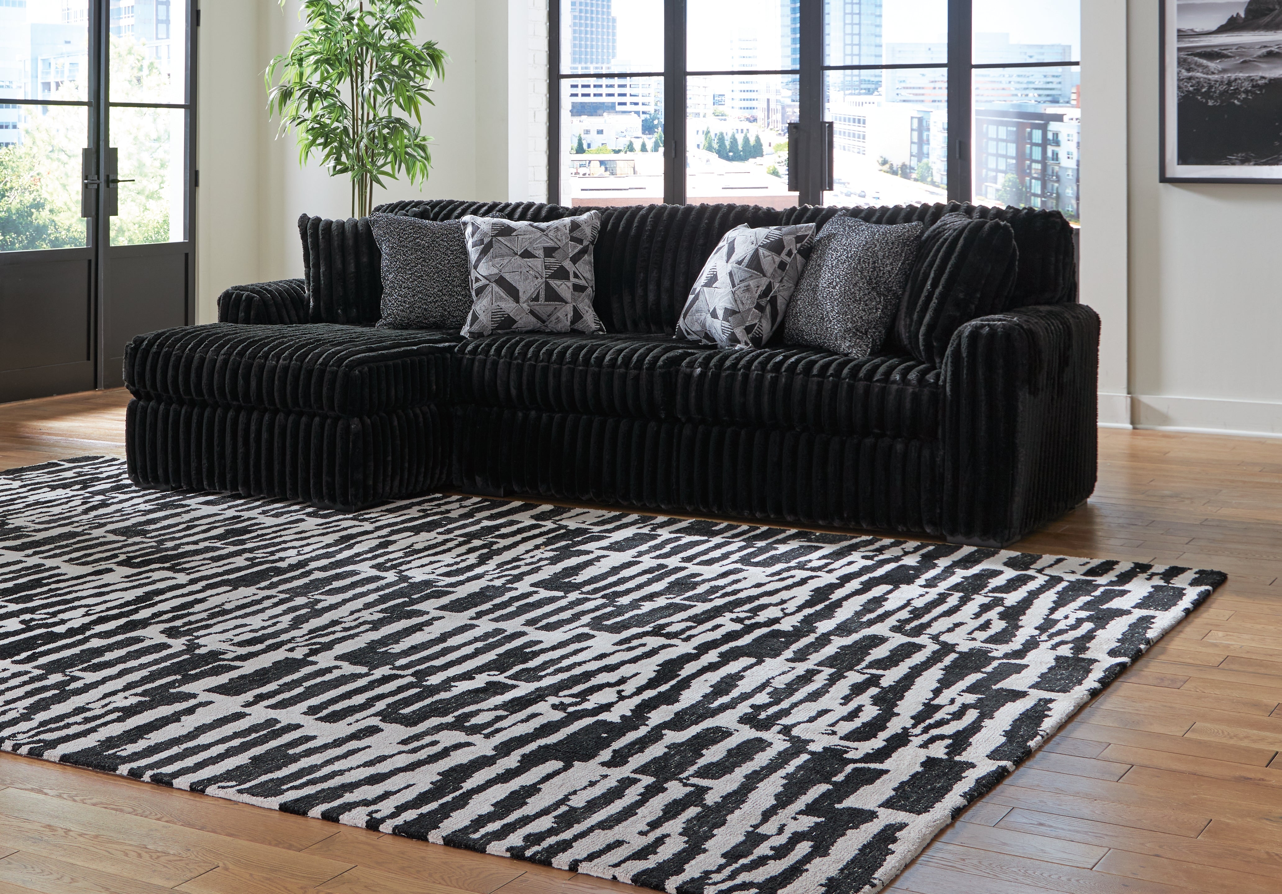 Homestyle Furniture - Ashley Furniture - Midnight-Madness 2-Piece Sectional Sofa with Chaise - RAF 2-Piece Sectional Sofa with Chaise / Onyx - 98103S1