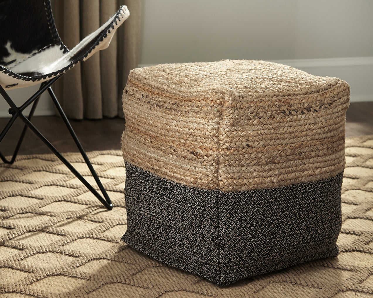 Homestyle Furniture - Ashley Furniture - Sweed Valley Pouf - Pouf / Natural/Black - A1000422