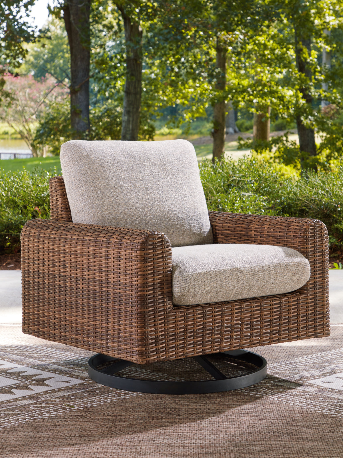Homestyle Furniture - Ashley Furniture - Dolan Creek Outdoor Swivel Lounge Chair with Cushion - Swivel Lounge w/ Cushion - PCP610-821