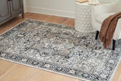 Homestyle Furniture - Ashley Furniture - Gregmoore 5'2" x 6'10" Washable Rug - 5'2" x 6'10" Washable Rug - R405822